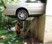 Car Crushed On A High Wall - Funny Pictures