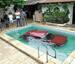 Car in a swimming pool - Funny Pictures